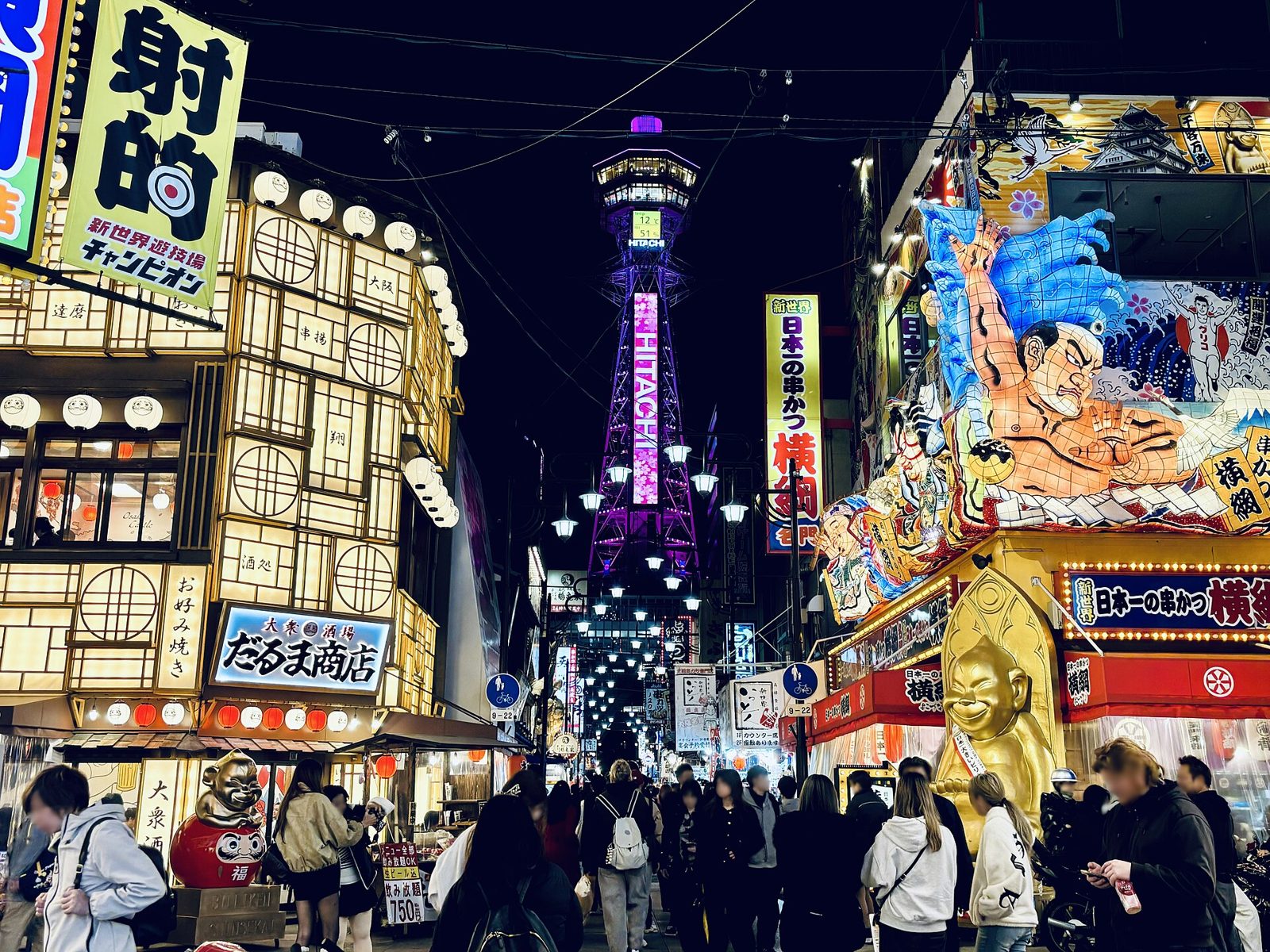 Shinsekai lit up beneath the Tsutenkaku tower